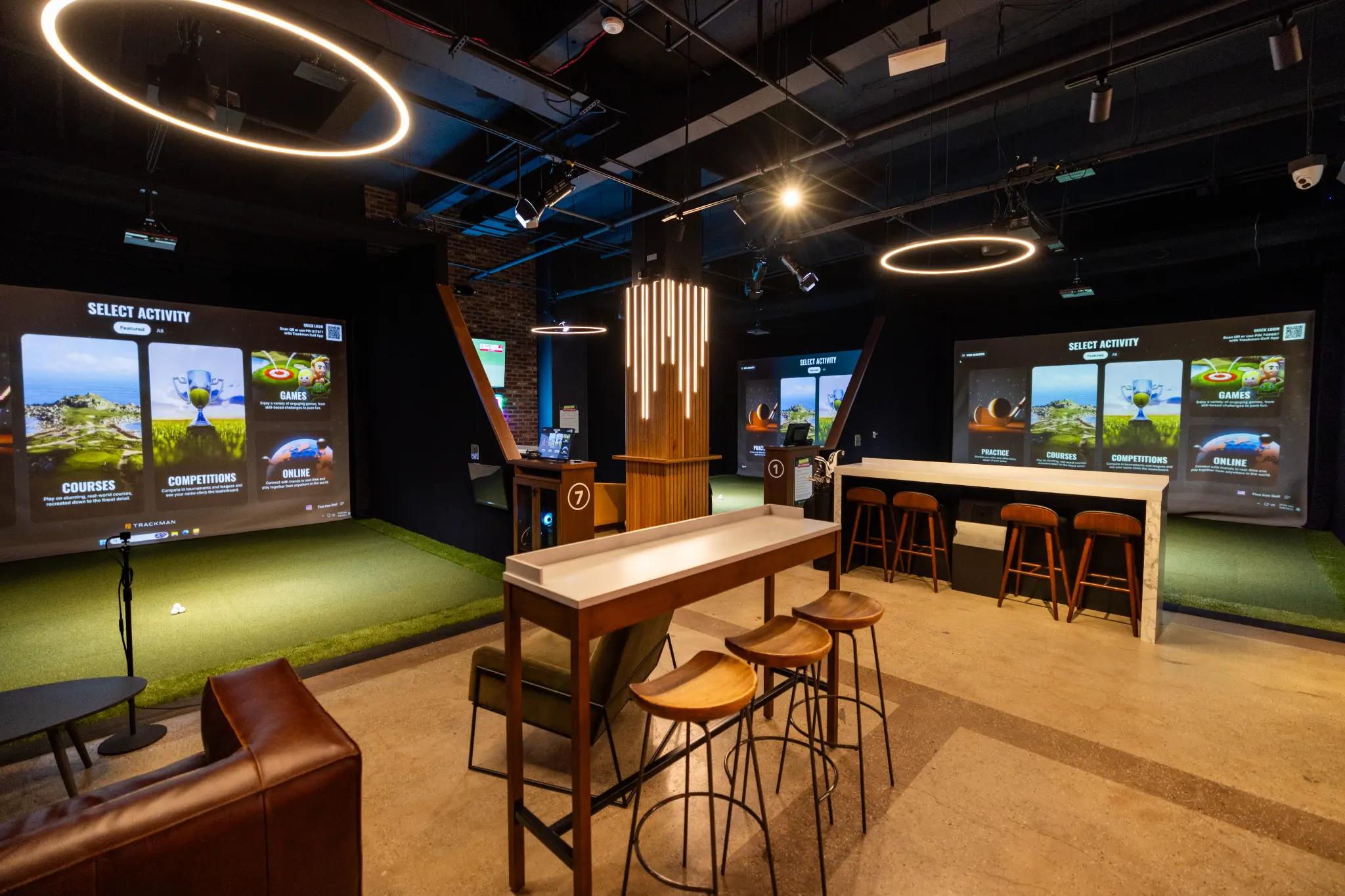 Five Iron golf bays integrated with a hospitality setting