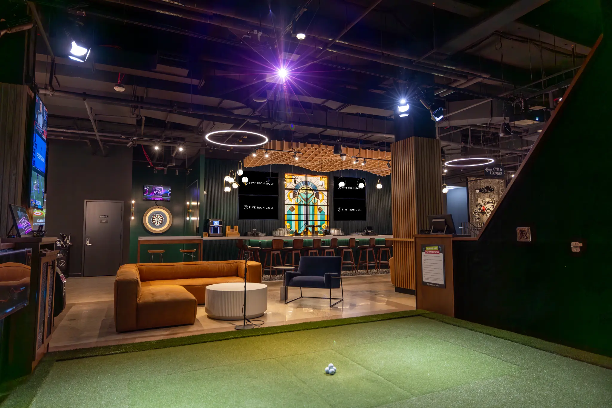 Five Iron Core social space and golf simulator bays
