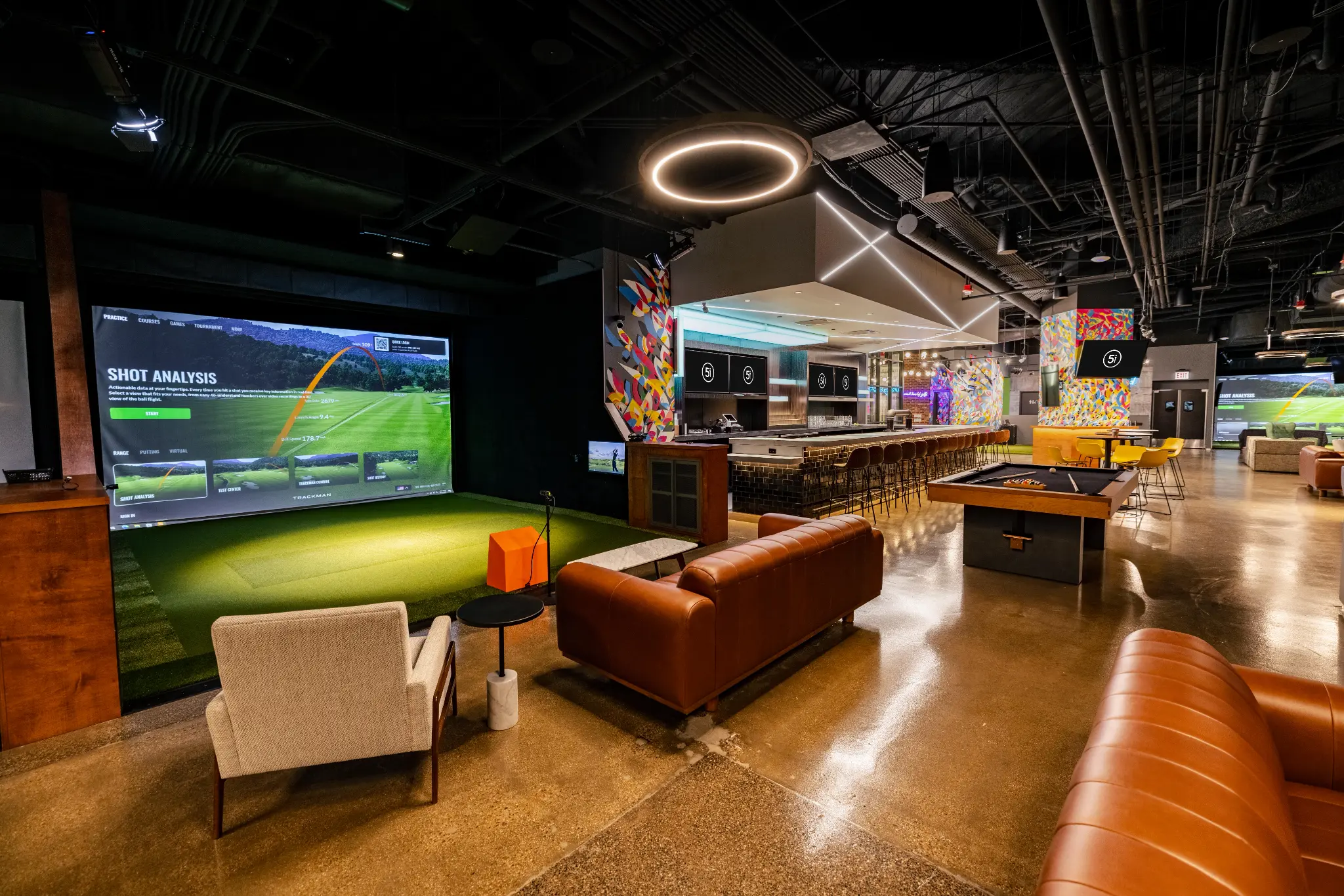 Five Iron Core venue with simulator bays and a social bar