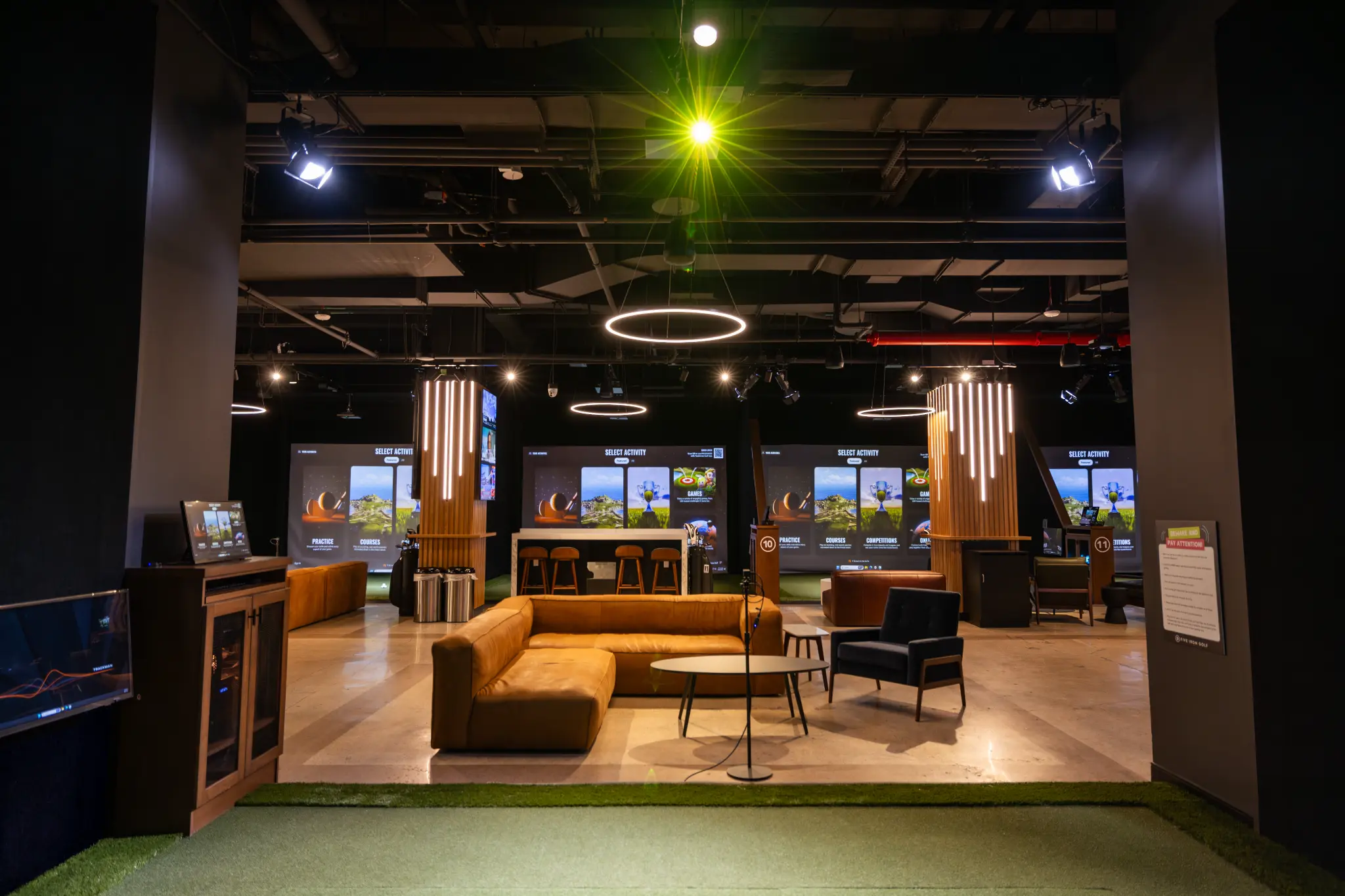 Five Iron Core simulator bays and guest seating